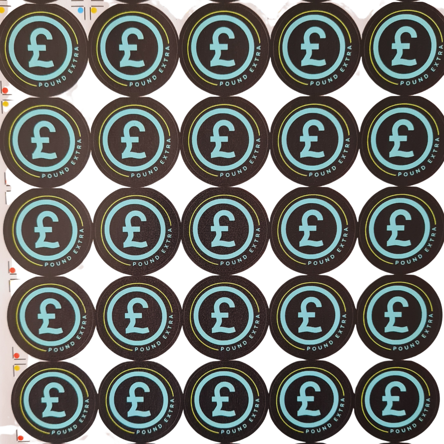 Multiple circular stickers with a pound symbol on a white background