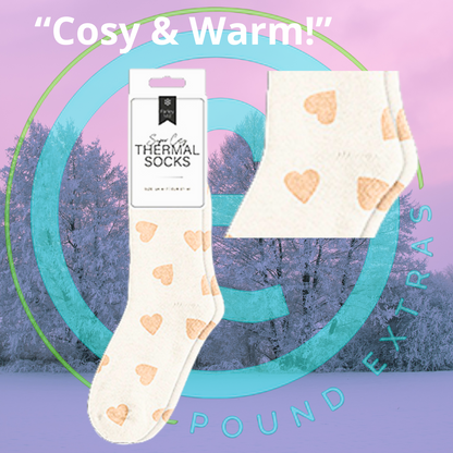 White thermal socks with heart patterns and packaging on a colorful abstract background.