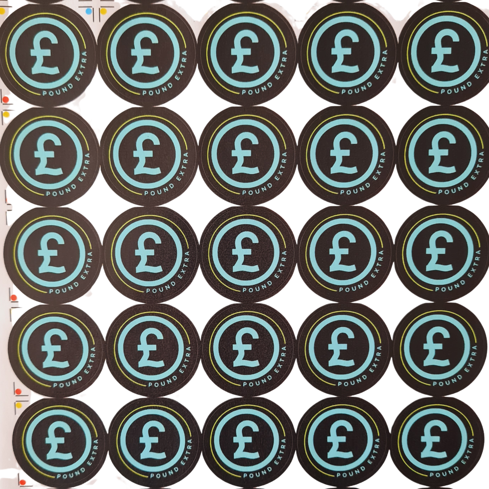 Multiple circular stickers with a pound symbol on a white background