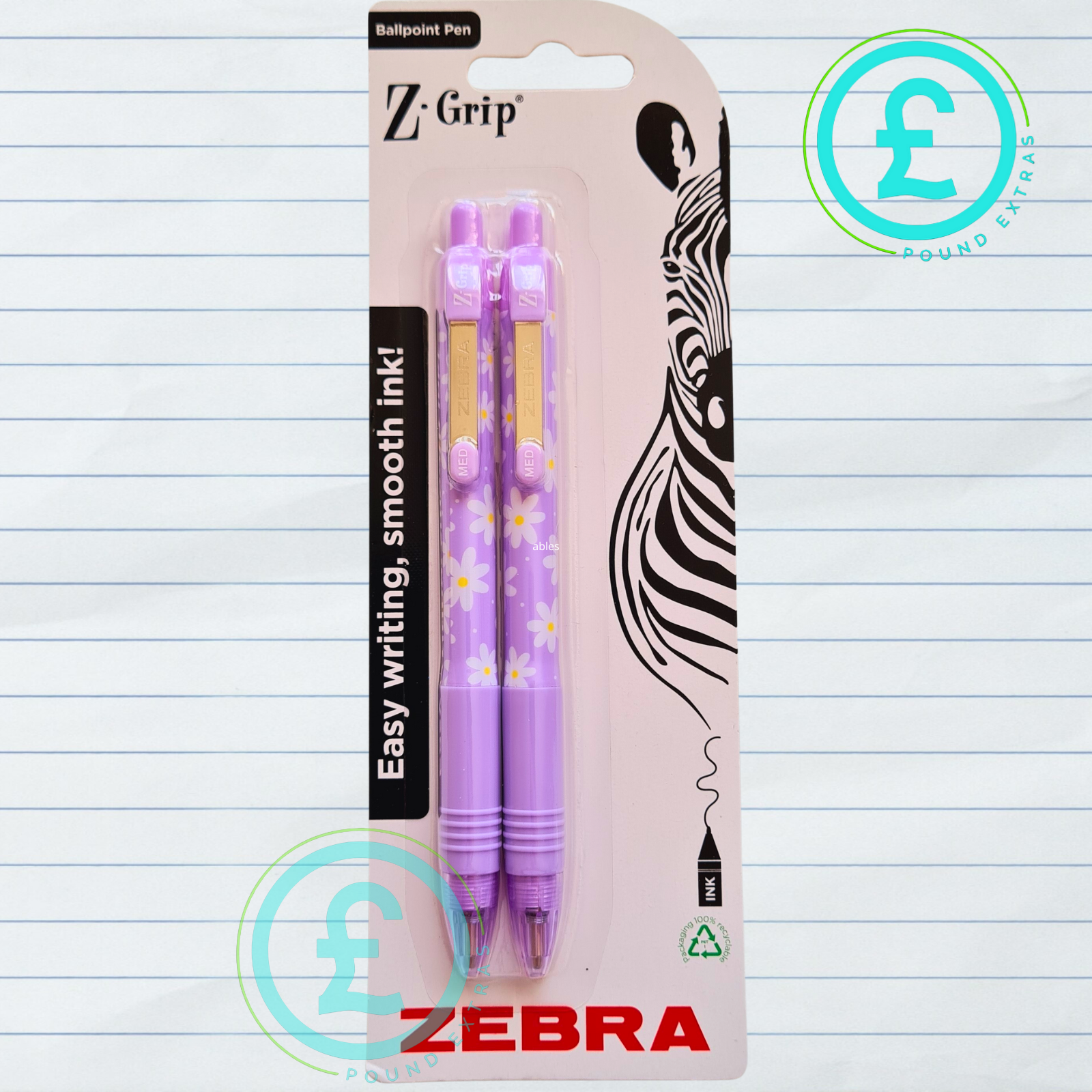 Zebra Z-Grip ballpoint pen packaging with purple pens on a lined paper background