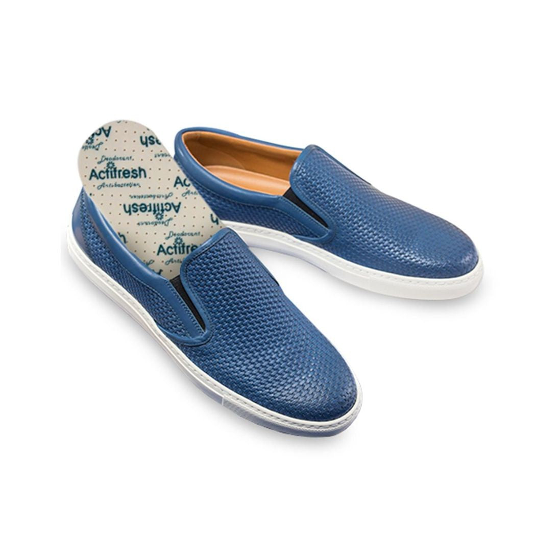 Blue slip-on shoes with ActiFresh insole on a white background